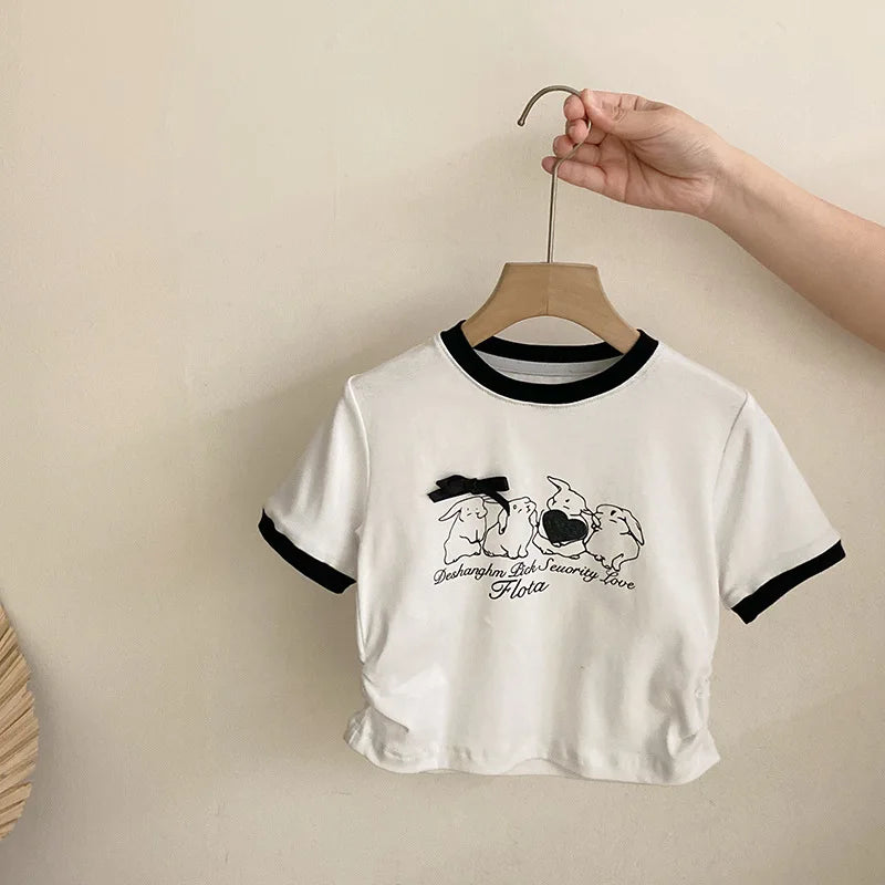 Girls' Summer Clothing New Korean Bow Cartoon Short Sleeved 2025 Lace Checkered Versatile Cake Skirt Two-piece Set